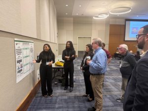 Amanda Bradley presents student research poster SUPERVISION2025